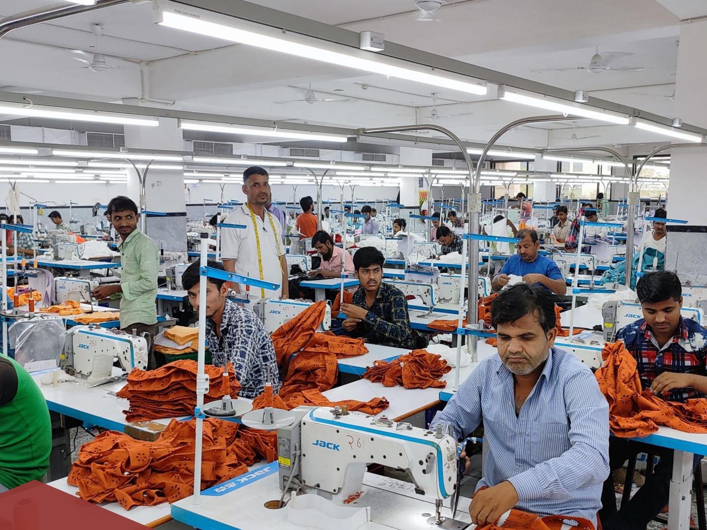 Apparel manufacturing team working on the production floor